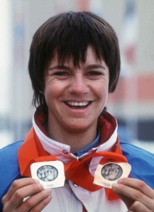 French skier Perrine Pelen smiles as she shows her two Olympic medals, 18 February 1984 in Sarajevo, at the Winter Olympic Games. Pelen won the silver medal in the slalom, 17 February, and the bronze medal in the giant slalom, 13 February.   AFP PHOTO (Photo credit should read STAFF/AFP/Getty Images)